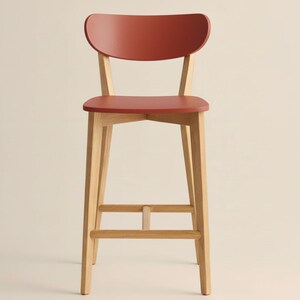 May include: A bar stool featuring a light-toned wooden frame with four tapered legs and a horizontal footrest. The seat and the curved backrest are finished in a solid, matte terracotta red colour, providing a contrast to the natural wood grain.