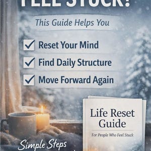 May include: A book titled "Life Reset Guide" with the text "For People Who Feel Stuck" is displayed next to a mug and lit candles. The image also includes the text "Feel Stuck?" and "Simple Steps for a Clearer Path".