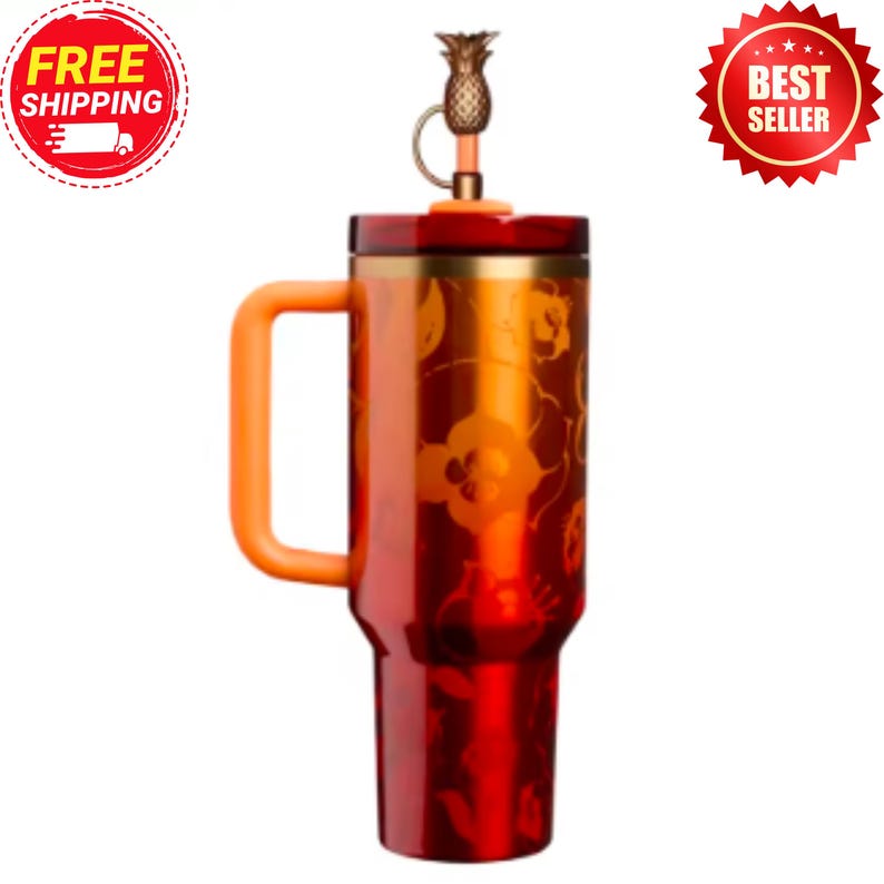 May include: A red and orange insulated travel mug with a handle. The mug has a floral pattern and a pineapple-shaped lid. The handle and lid accents are orange. Designed to keep drinks hot or cold, it is suitable for travel.