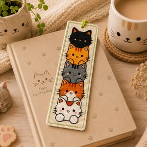 Adorable cat stack cross stitch bookmark pattern featuring five kawaii cats peeking one above another in black, orange, gray, orange-and-white, and white colors. This cute animal bookmark design is stitched with 9 DMC colors and measures 40 × 125 stitches. Perfect for cat lovers, bookworms, and beginner to intermediate cross stitch enthusiasts. Ideal as a handmade reading accessory, thoughtful gift, or DIY embroidery project with instant PDF download for creating a charming bookmark.