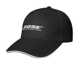 May include: Black baseball cap with the white text "BOSE" and the tagline "Better sound through research." The cap has a curved brim with a white trim. The cap is made of a durable material.