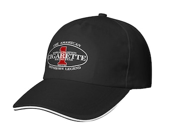 May include: Black baseball cap with a white trim and a curved brim. The cap features the text "THE AMERICAN WORLD CHAMPION CIGARETTE RACING TEAM OFFSHORE LEGEND" in white and red lettering.