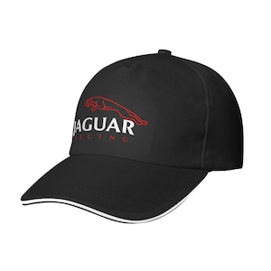 May include: Black baseball cap featuring the Jaguar Racing logo in red and white. The cap has a curved brim with a white stripe along the edge. The Jaguar logo includes a leaping jaguar and the word "JAGUAR" above "RACING".