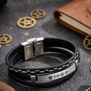 Personalized brown leather bracelet with custom music code engraving for Father’s Day