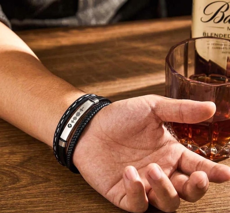 Personalized brown leather bracelet with custom music code engraving for Father’s Day