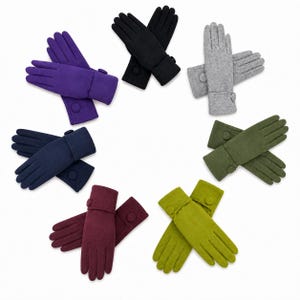 May include: A collection of seven pairs of gloves arranged in a circle, featuring solid colours including purple, black, grey, olive green, lime green, burgundy, and navy blue. Each pair of gloves has a folded cuff detail with a single matching button.