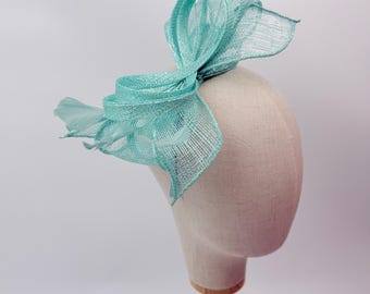 Nytt turkos fascinatorhårband med rosett och fjädrar Royal Ascot Kentucky Derby bröllopshatt