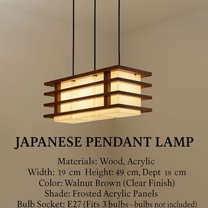 May include: A Japanese pendant lamp made from wood and acrylic. The rectangular lamp has a walnut brown finish and frosted acrylic panels. It measures 19 cm wide, 49 cm high, and 18 cm deep. The lamp hangs from three black cords.