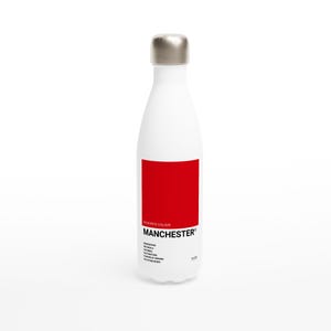 May include: White insulated water bottle with a silver cap and a large red rectangle. The text "FAVOURITE COLOUR MANCHESTER" is printed below the red rectangle. The bottle is designed to hold liquids.