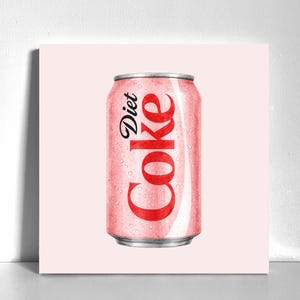 May include: A vertical aluminum beverage can featuring a light pink exterior with condensation droplets. The text Diet Coke is printed in bold red lettering vertically along the center of the can. The top and bottom rims are a metallic silver color.