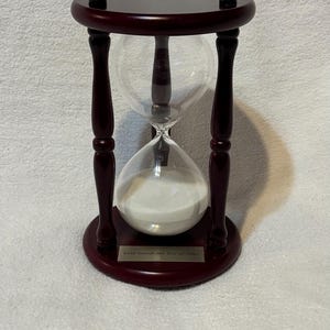 May include: A set of three ceramic mugs with a speckled, matte finish. The mugs are in shades of blue, green, and white. Each mug has a simple, modern design, perfect for coffee or tea.