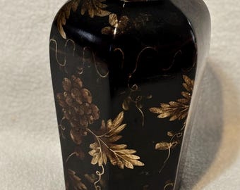 Jarrón japonés vintage negro mate con diseño de flores doradas