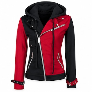 May include: A color-blocked jacket featuring a black hood and sleeves paired with a red torso. The garment includes an asymmetrical silver zipper closure, silver metal hardware, a small flap pocket on the right side, and buckled straps at the cuffs.