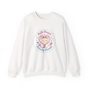Sweet Nurse Patch Crewneck Sweatshirt | pastel kawaii nurse graphic, coquette medical design