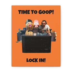 Puede incluir: Impresión en lienzo naranja con el texto "TIME TO GOOP!" en la parte superior y "LOCK IN!" en la parte inferior. La imagen presenta un cacahuete de dibujos animados, una persona con un gorro rosa y una persona con auriculares jugando a un videojuego.