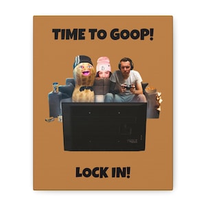 Puede incluir: Impresión en lienzo con el texto "TIME TO GOOP!" en la parte superior y "LOCK IN!" en la parte inferior. La imagen presenta a tres personas, una es un personaje de cacahuete, y las otras dos jugando videojuegos frente a un televisor grande.