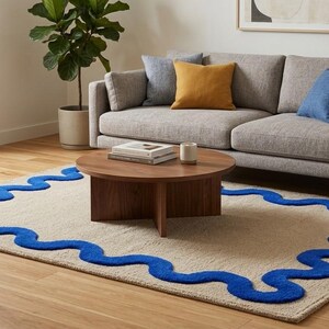 May include: A set of three ceramic mugs with a speckled, matte finish. The mugs are in shades of cream, light gray, and dark gray. Each mug has a simple, modern design and a rounded handle.