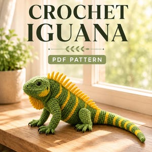 May include: A crocheted iguana in shades of green and yellow, with the text "CROCHET IGUANA PDF PATTERN". The iguana has a detailed, textured appearance, with yellow stripes and a spiky crest. It is posed on a wooden surface near a window.