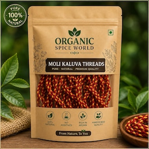 Peut inclure: Un sachet debout beige étiqueté Organic Spice World Moli Kaluva Threads. L'emballage présente une fenêtre transparente montrant des fils tressés rouges et jaunes. Le texte indique 100% Naturel, Sans Additifs, Riche en Arôme et Qualité Sélectionnée.