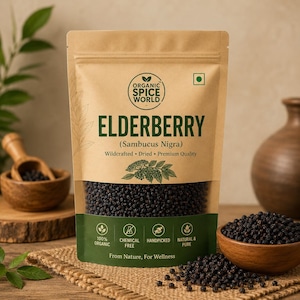 May include: A kraft paper bag of elderberries with a clear window, labelled "Organic Spice World" and "Elderberry (Sambucus Nigra)". The bag is on a burlap mat, with a wooden bowl of elderberries and a wooden scoop in the background. The text reads "Wildcrafted, Dried, Premium Quality".