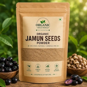 May include: A brown paper pouch containing organic jamun seeds powder. The label features the text Organic Spice World, 100% Pure & Natural, Organic Jamun Seeds Powder, 100% Pure | Natural | Chemical Free, and Goodness of Nature with four icons.