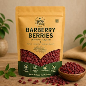 May include: A tan packet of barberry berries, with a clear window revealing the red berries inside. A wooden bowl filled with berries is to the right. The packet is labelled "Organic Spice World" and "Barberry Berries (Berberis Vulgaris)".