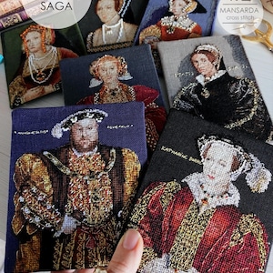 May include: A collection of seven rectangular cross-stitch portraits featuring historical figures in ornate Tudor-style clothing. Each piece displays detailed embroidery on fabric, including text labels like Katharing Darre, with varied background colours.