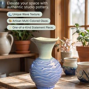 May include: A ceramic vase with a bulbous base featuring a blue wave texture and a smooth, light green flared neck. Text on the image reads: Tired of Mass-Produced Decor? Elevate your space with authentic studio pottery. Unique Wave Texture. Artisan Multi-Colored Glaze. One-of-a-Kind Statement Piece.