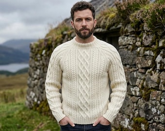 May include: An off-white, long-sleeved crew neck sweater featuring a prominent cable knit pattern on the front. The garment is constructed with a ribbed collar, ribbed cuffs, and a ribbed hem, showcasing a thick, textured knit design throughout.