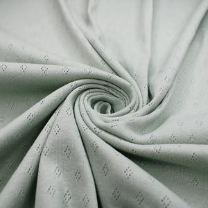 Fine 100% cotton jersey knit with Diamond openwork/ Pointelle fabric by the half metre.