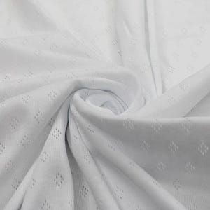 Fine 100% cotton jersey knit with Diamond openwork/ Pointelle fabric by the half metre.