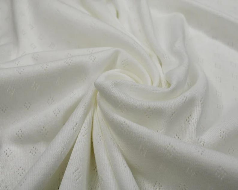 Fine 100% cotton jersey knit with Diamond openwork/ Pointelle fabric per metre Cream