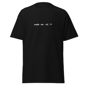 May include: Black t-shirt with the text "sudo rm -rf /*" printed in white. The shirt is a classic crew neck style, made of a soft material. A simple, yet bold design for tech enthusiasts.