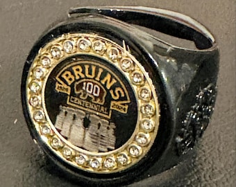 The BOSTON BRUINS 100 CENTENIAL deCAPitator Stainless Steel Ring Bottle Opener | Champion Replica ring