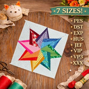 May include: A square fabric quilt block featuring a multi-colored star pattern with red, pink, orange, yellow, green, blue, and purple sections on a light blue patterned background. Text on the right reads 7 SIZES! PES, DST, EXP, HUS, JEF, VIP, VP3, XXX.