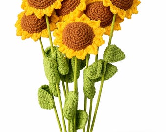 May include: A bouquet of handmade crochet sunflowers. The flowers have yellow petals, brown centers, and green stems and leaves. The sunflowers are arranged in a bunch, creating a cheerful and vibrant display.