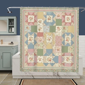 May include: A shower curtain featuring a patchwork quilt design with a floral pattern. The fabric displays a grid of squares in soft pastel shades of pink, blue, yellow, and green, accented by small rose motifs and checkered textures throughout.