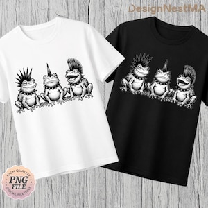 May include: Two t-shirts, one white and one black, each featuring a graphic of four punk rock frogs. The frogs are drawn in black and white, with spiky mohawks, studded collars, and smiling faces. The white shirt has a "High Quality PNG File" logo.