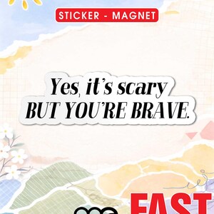 May include: A sticker or magnet with a motivational quote, "Yes, it's scary BUT YOU'RE BRAVE," against a pastel watercolor background. The design includes a sun illustration and the text "STICKER - MAGNET."