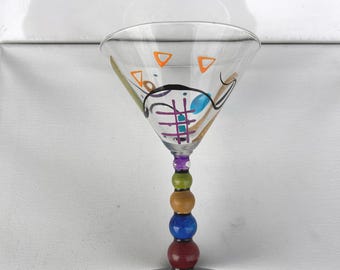 designer painted glass cup made by her in her gallery Hopfinger