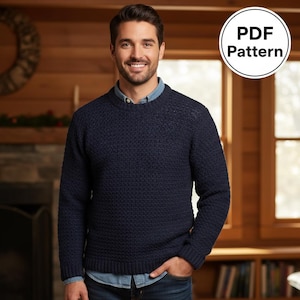 Könnte beinhalten: Ein marineblauer Strickpullover mit strukturiertem Muster. Der Pullover hat einen Rundhalsausschnitt und lange Ärmel. Das Bild enthält eine runde Grafik mit der Aufschrift "PDF Pattern".