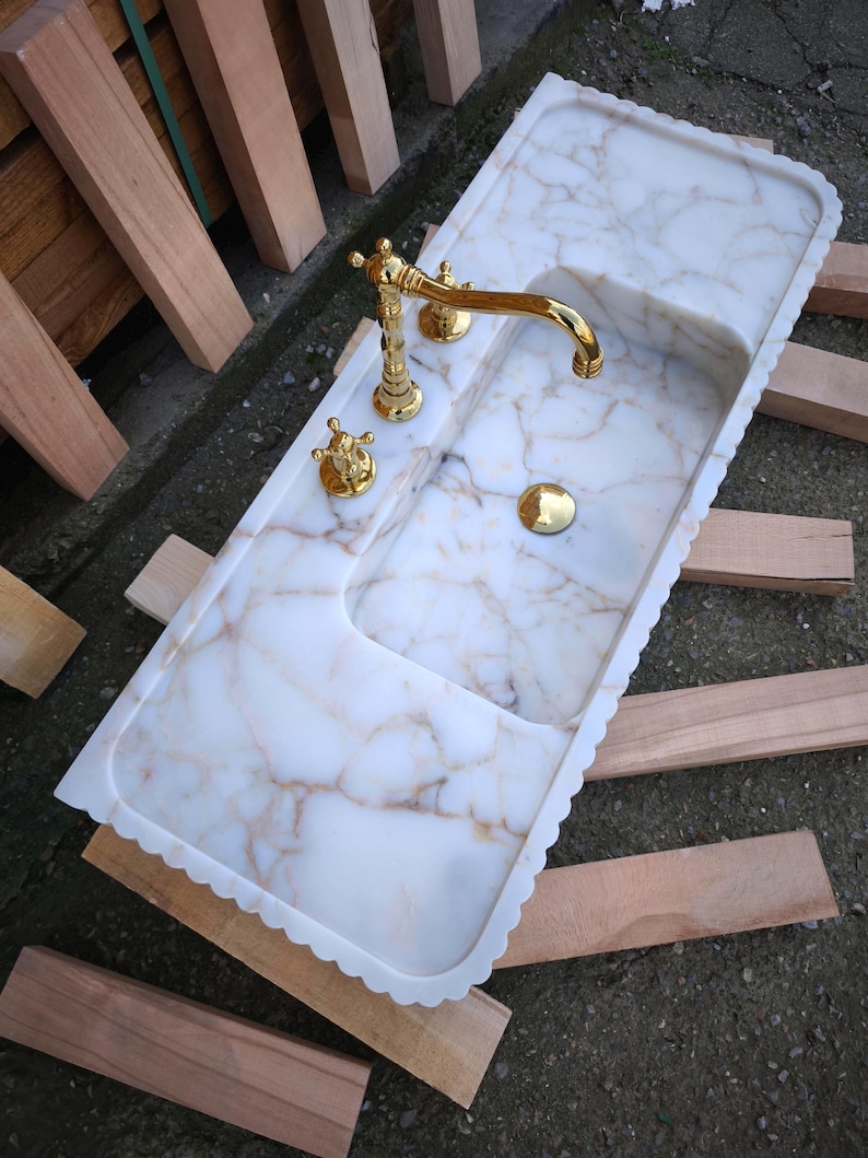 Searching for a custom marble sink? We offer integrated marble sinks and marble floating sinks made to order! Choose from lilac marble sinks, travertine marble sinks, and more to complete your perfect luxury bathroom renovation.
Handcrafted marble sinks from Turkey. Find marble basin sinks, vanity sinks, and custom sink tops in beautiful natural stones like viola marble.
Elevate your bathroom with a custom marble sink. From calacatta gold, antique marble sink options, handcrafted in Turkey.