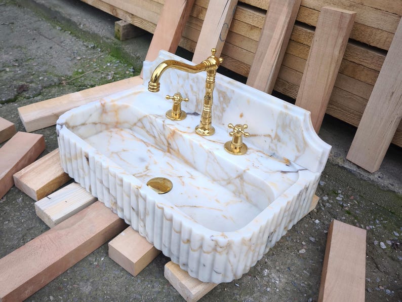Upgrade your vanity with a marble sink top or a marble vanity sink in gorgeous carrara marble or calacatta monet marble. Our sinks combine elegance with functionality, offering both wall mounted and pedestal sink options for every design. Luxury marble sinks made from aegean marble, carrara, and calcutta marble. Wall-mounted, pedestal, and floating styles available. Shop handmade marble sinks crafted from Turkish stone. Explore calacatta, carrara, viola marble sinks for bathrooms and kitchens.
