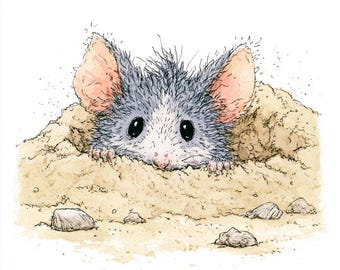 May include: A watercolour illustration of a small, fluffy grey and white mouse peeking out from a pile of tan sand. The mouse has large, dark eyes, pink-tinted ears, and visible whiskers. Several small, grey rocks are scattered in the foreground.