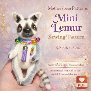 May include: A miniature lemur soft toy, around 15 cm tall, with a grey and white body, a striped tail, and a colourful beaded collar. The image includes text that says "Mini Lemur Sewing Pattern".
