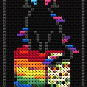 May include: Cross-stitch design of a black cat sitting atop a rainbow-colored box. The cat is outlined in black and has colorful accents. The box is divided into sections of rainbow hues and a patterned section.