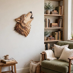 May include: A wall-mounted wolf head sculpture crafted from layered wooden pieces in various shades of brown, tan, and cream. The wolf is depicted with its head tilted upward in a howling position, featuring intricate textures and geometric wood segments.