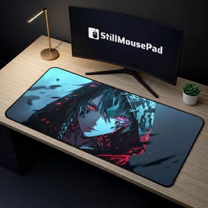May include: A rectangular mousepad featuring a detailed anime-style illustration of a character with red eyes and dark hair. The design incorporates shades of blue, black, and red. The mousepad is placed on a wooden desk, with a computer monitor and desk lamp in the background.