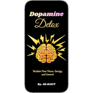 May include: A smartphone displays a black screen with the words "Dopamine Detox" in a gradient font. Below the title is a stylized brain graphic with lightning bolts. The text "Reclaim Your Focus, Energy, and Control" is below the graphic, with "By. AB.BASIT" at the bottom.