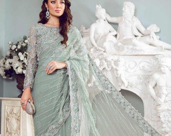 see green saree party wera pakistani indian wedding guest outfit